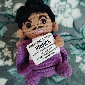 Purple Crochet Doll with Sign